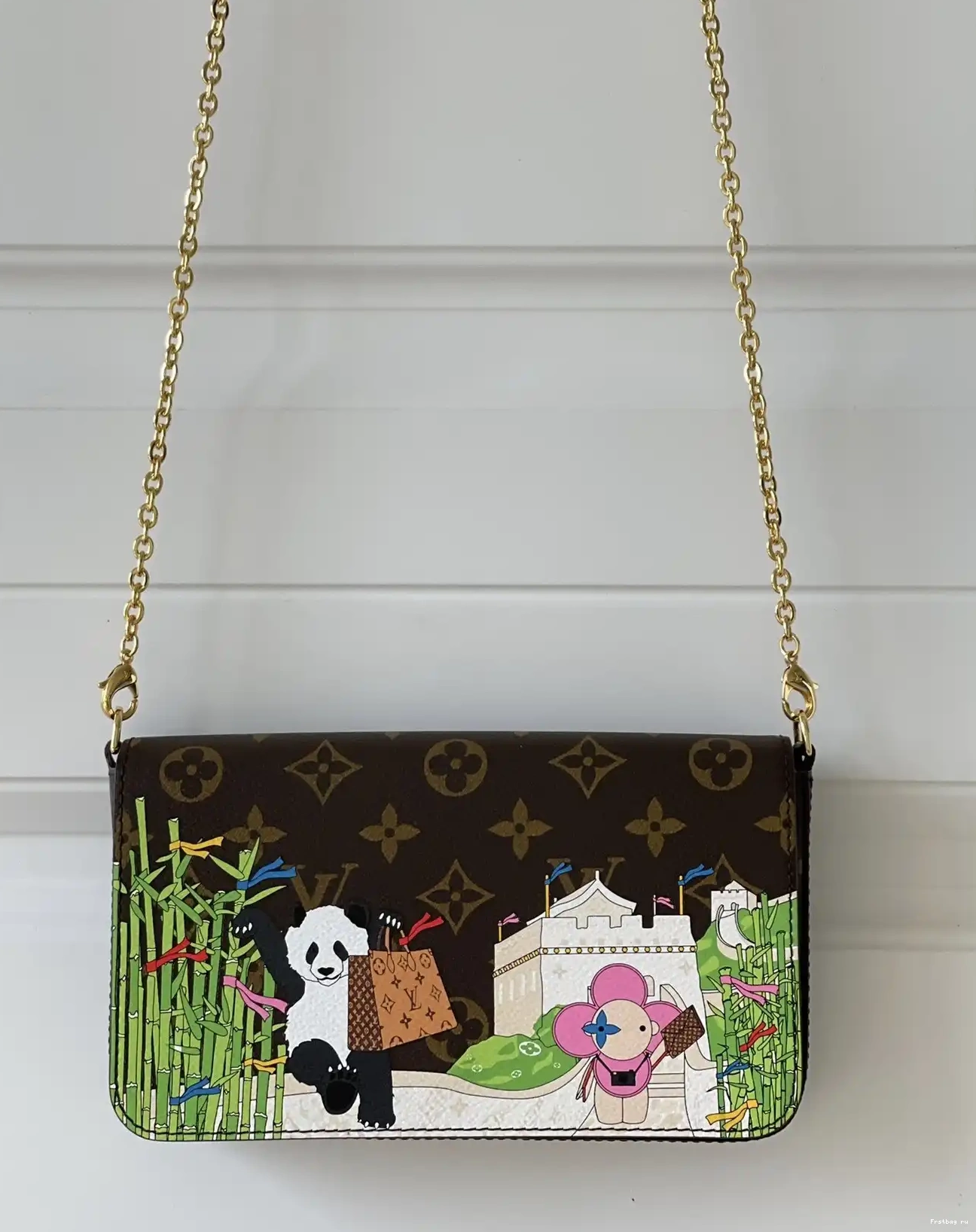 FÉLICIE LOUIS POCHETTE VUITTON 0503